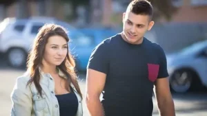 A guy approaches a pretty girl